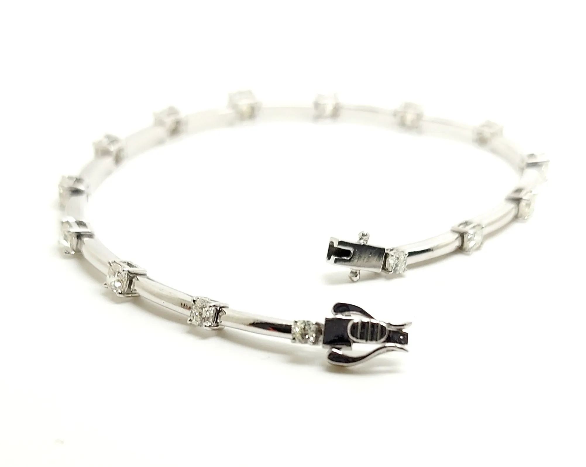CUSHION DIAMOND STATION BRACELET IN WHITE GOLD AD NO. 2371