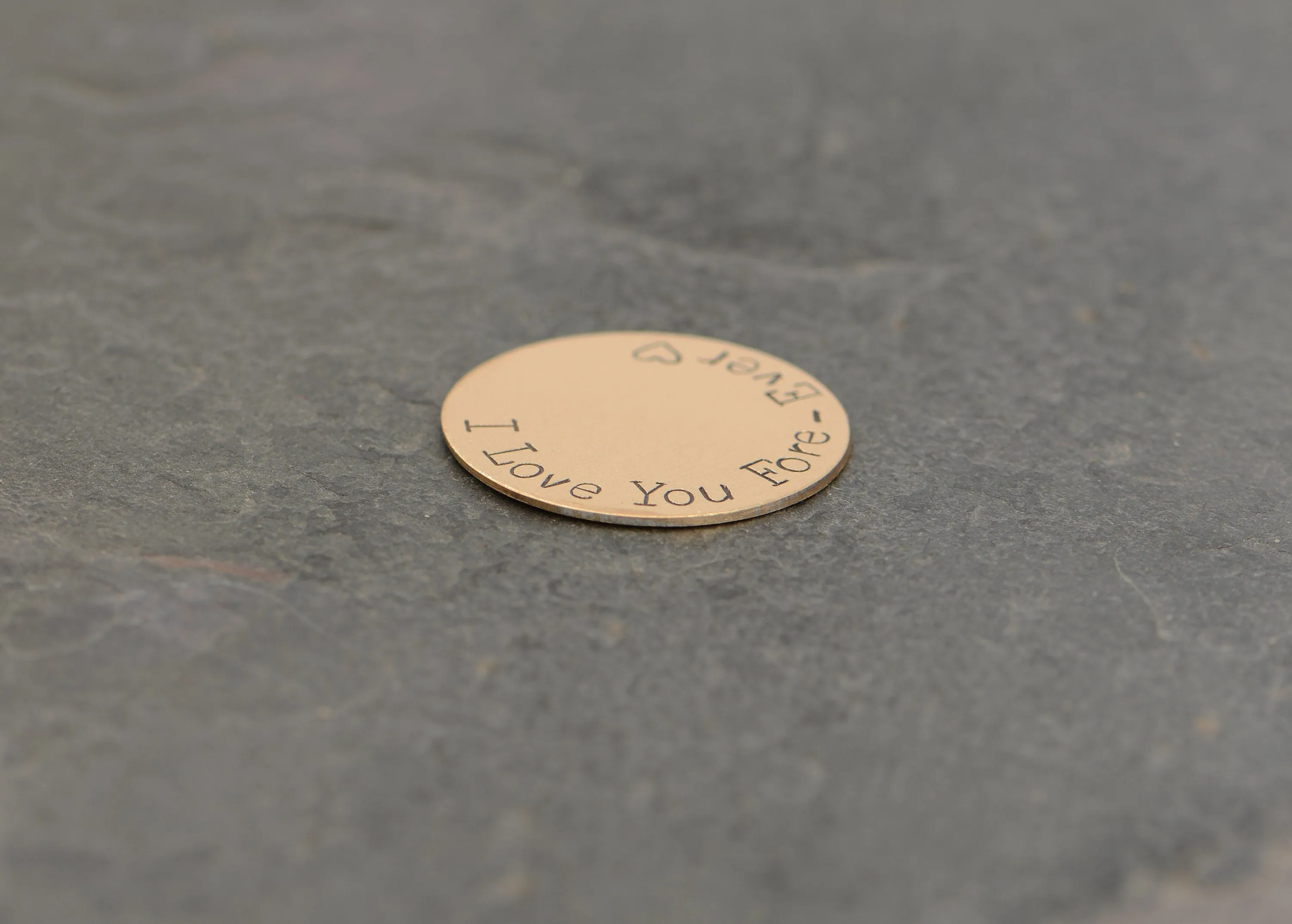Golf ball marker for 8th and bronze anniversaries