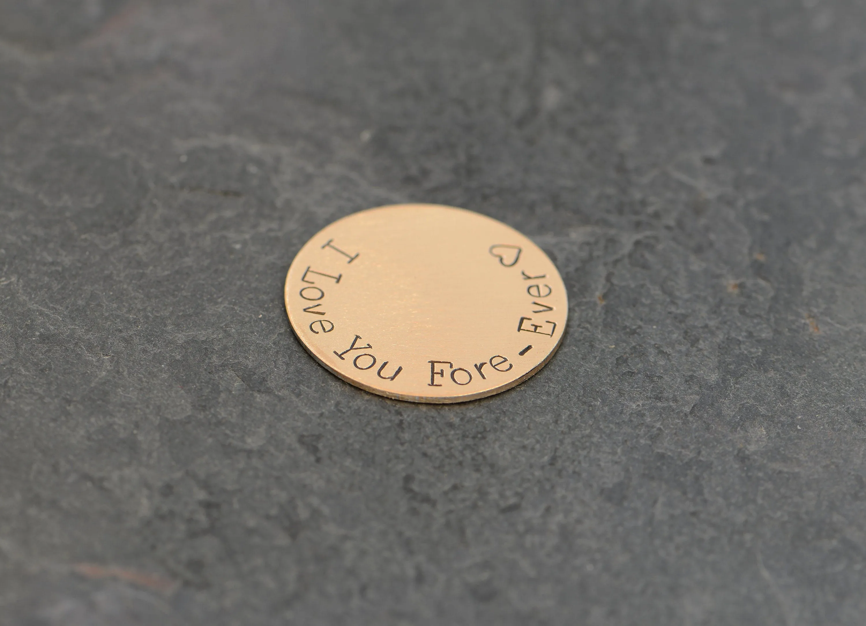 Golf ball marker for 8th and bronze anniversaries