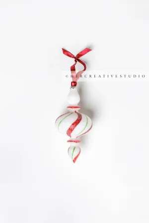 Red & Green Tree Ornament on White Background, Styled Image