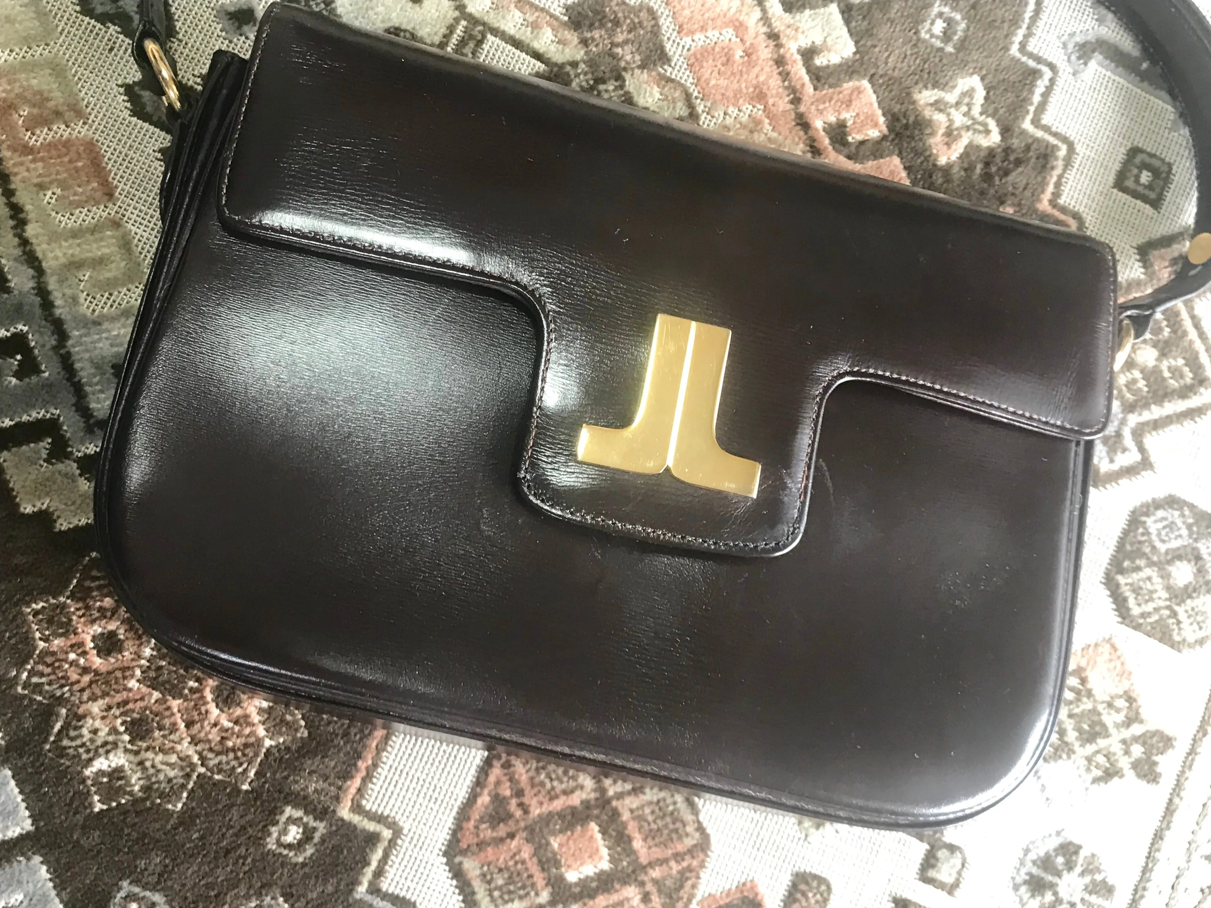 Vintage Lanvin dark brown leather elegant shoulder bag with iconic golden logo motif, Classic purse for daily use. 060620r1